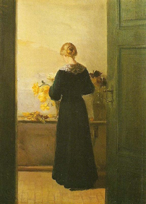 Anna Ancher en ung pige ordner blomster Norge oil painting art